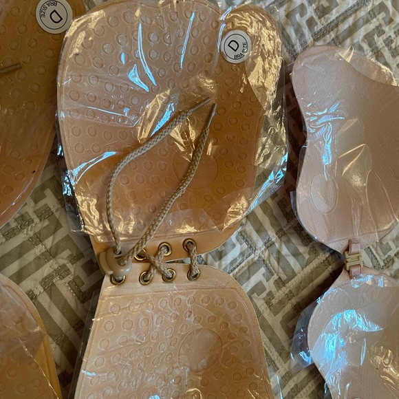 Nude/tan in color. Backless, strapless push up bras with silicone. - Picture 4 of 4